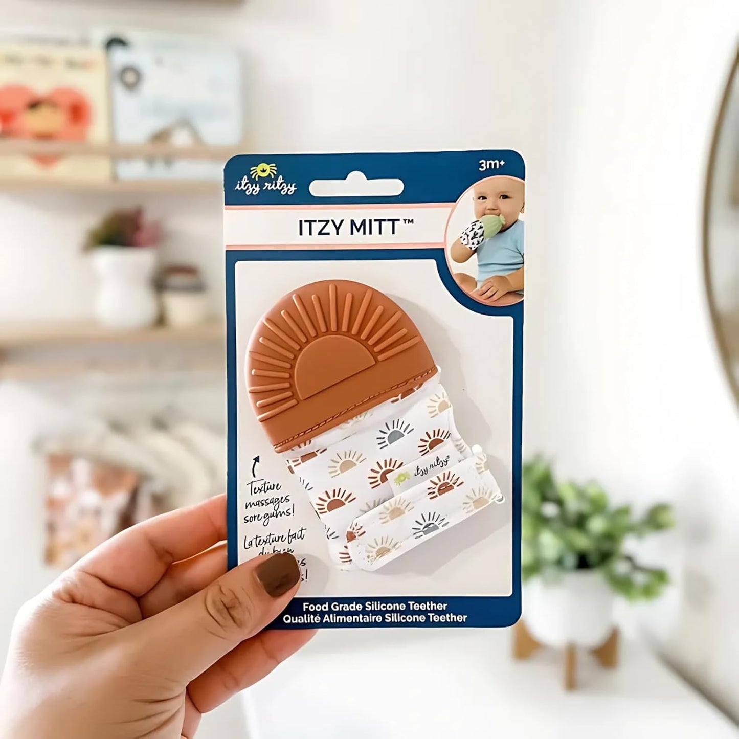 Itzy Ritzy Silicone Teething Mitt - Soothing Infant Teething Mitten with Adjustable Strap, Crinkle Sound & Textured Silicone to Soothe Sore & Swollen Gums - for Ages 3 Months & Up (Terracotta Sun)