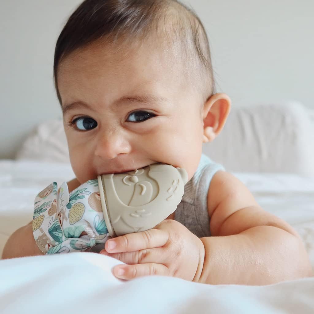 Itzy Ritzy Silicone Teething Mitt - Soothing Infant Teething Mitten with Adjustable Strap, Crinkle Sound & Textured Silicone to Soothe Sore & Swollen Gums - for Ages 3 Months & Up (Sloth)