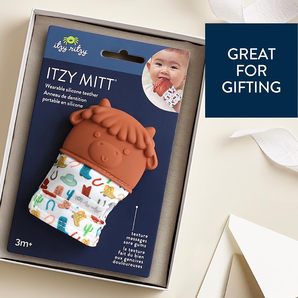 Itzy Ritzy Silicone Teething Mitt - Soothing Infant Teething Mitten with Adjustable Strap, Crinkle Sound & Textured Silicone to Soothe Sore & Swollen Gums - for Ages 3 Months & Up (Cow)