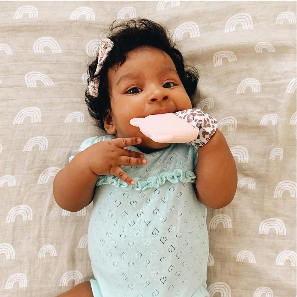Itzy Ritzy Silicone Teething Mitt - Soothing Infant Teething Mitten with Adjustable Strap, Crinkle Sound & Textured Silicone to Soothe Sore & Swollen Gums - for Ages 3 Months & Up (Blush Leopard)