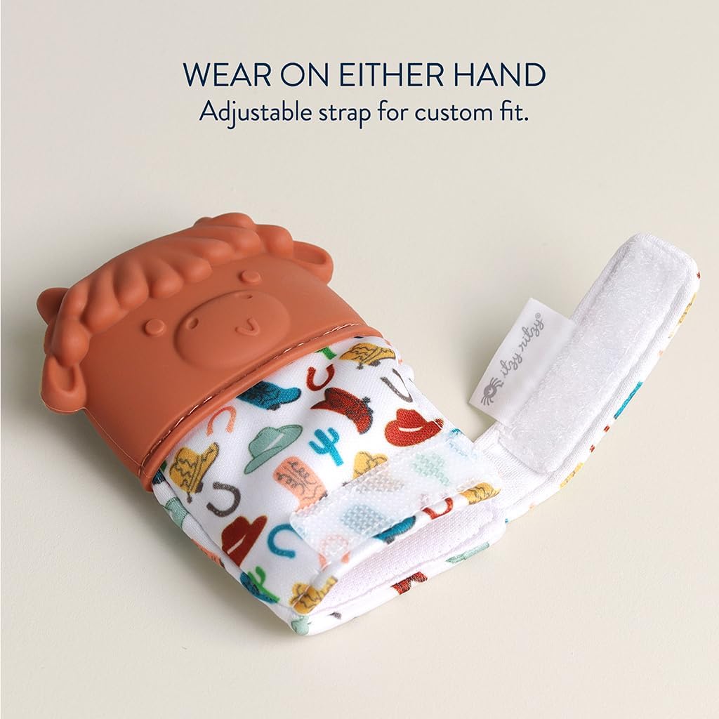 Itzy Ritzy Silicone Teething Mitt - Soothing Infant Teething Mitten with Adjustable Strap, Crinkle Sound & Textured Silicone to Soothe Sore & Swollen Gums - for Ages 3 Months & Up (Cow)