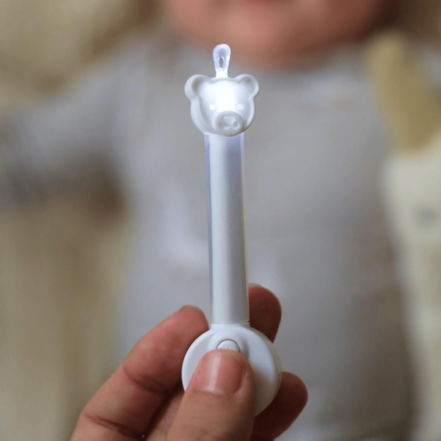 oogiebear Brite - Baby Nose Cleaner and Ear Wax Removal Tool. Baby Gadget with Nighttime LED Light. Safe Snot Booger Picker for Newborns, Infants & Toddlers