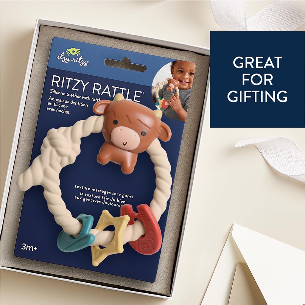 Itzy Ritzy Silicone Teether with Rattle; Rattle Teether Features Rattle Sound, Three Silicone Teething Rings and Raised Texture to Soothe Gums; Ages 3 Months and Up (Highland Cow)
