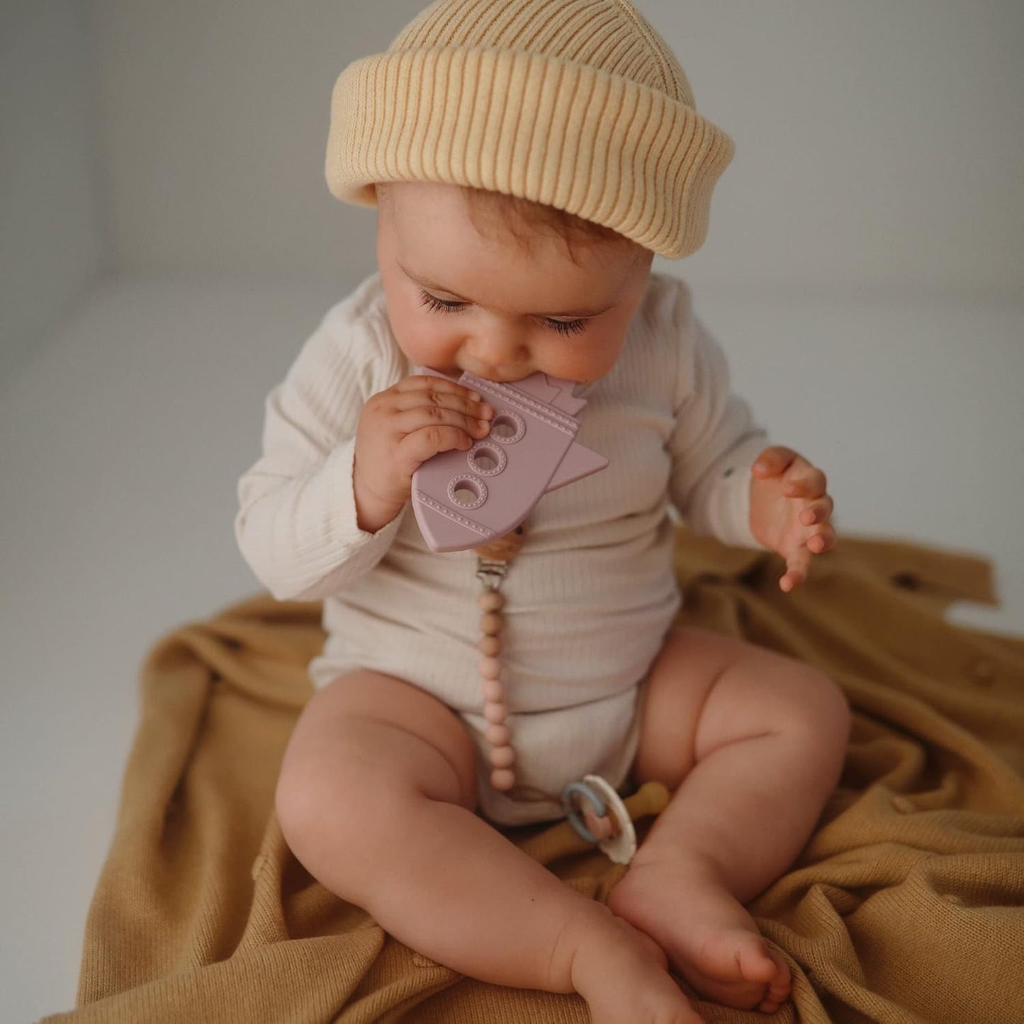mushie Silicone Baby Teether Toy | Rocket (Soft Lilac)