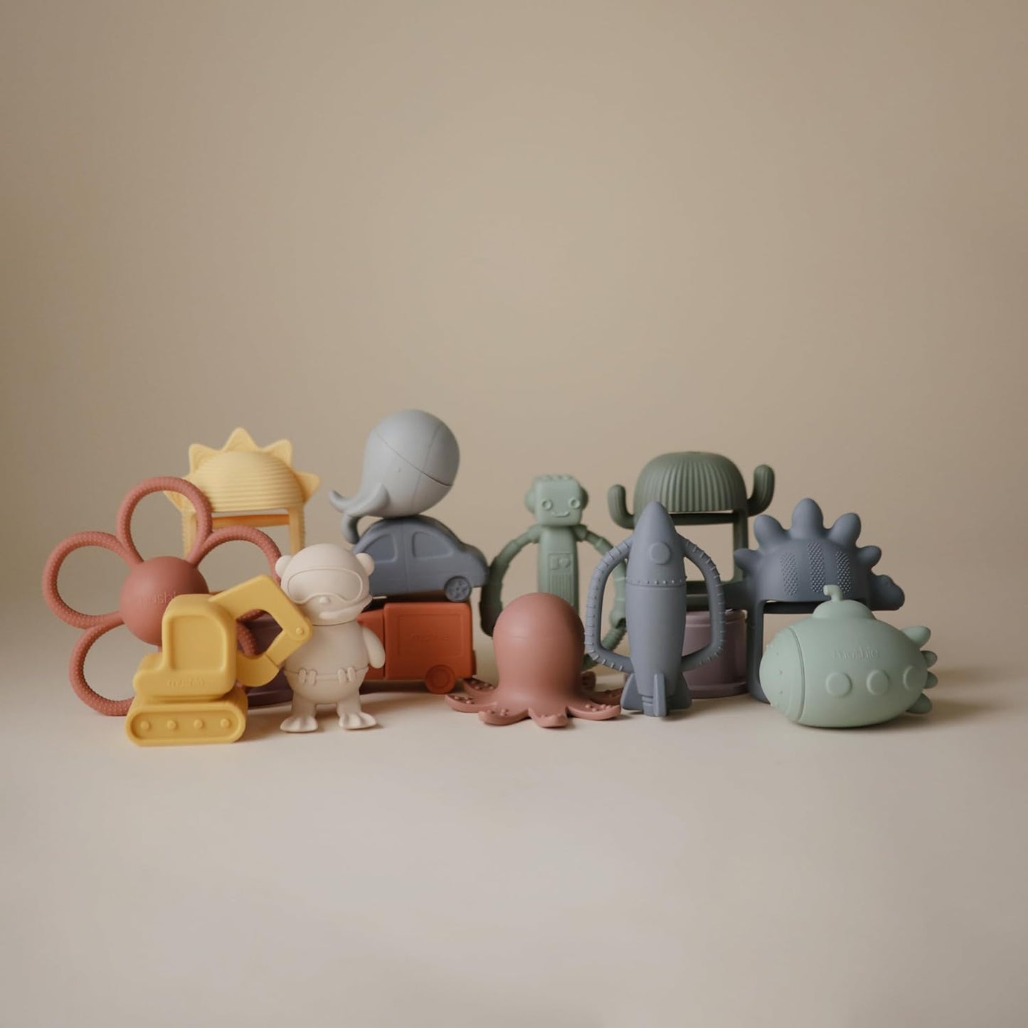 mushie Silicone Baby Rocket Rattle Teether Toy