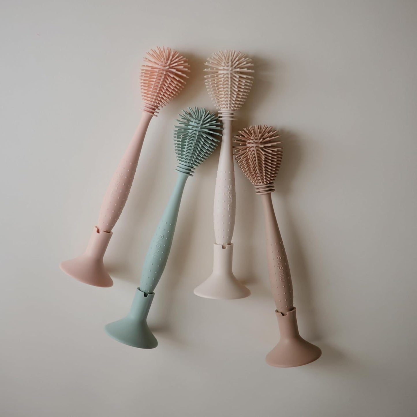 mushie Baby Bottle Brush | Soft Silicone with Suction Base (Shifting Sand)