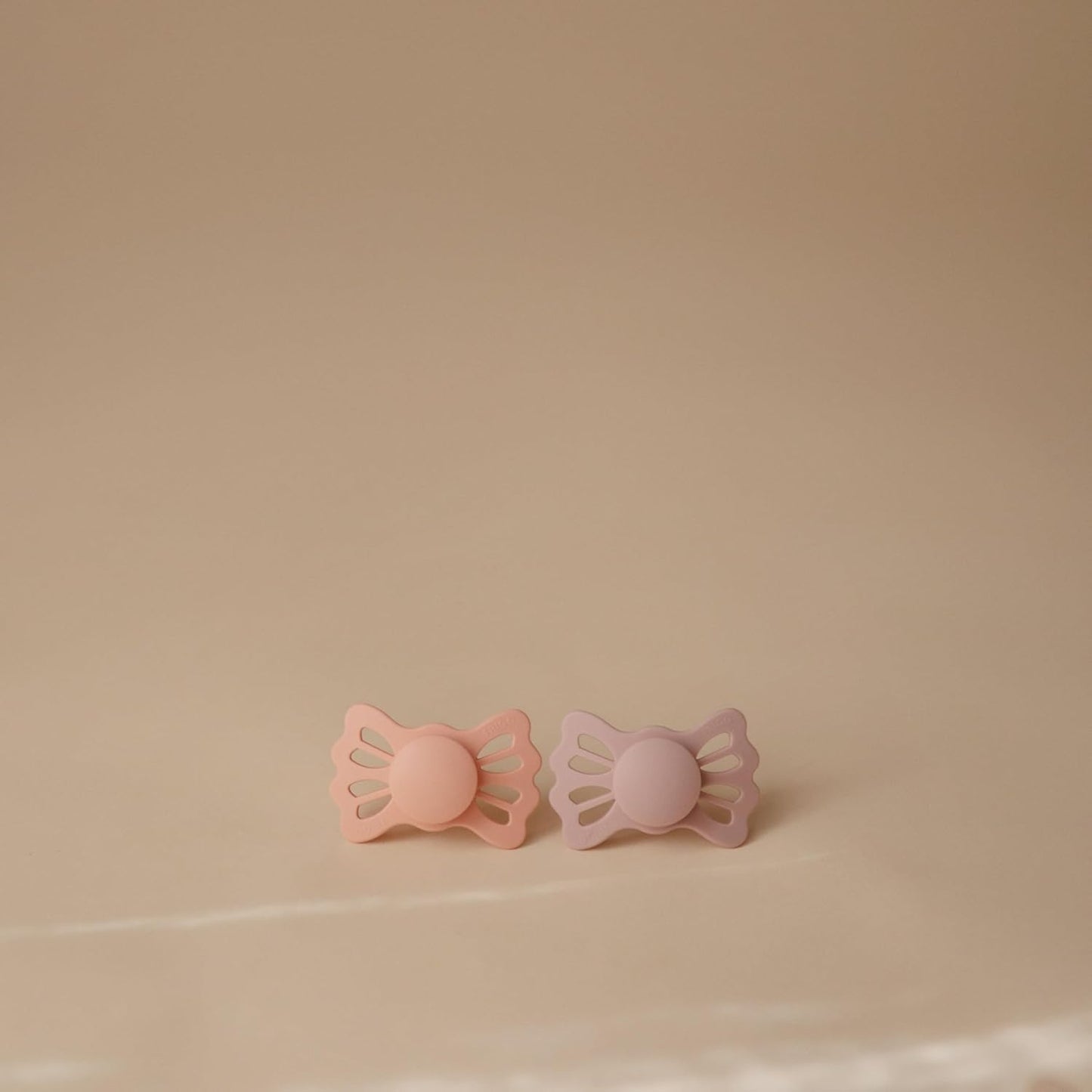 FRIGG Lucky Symmetrical SilkySoft Silicone Baby Pacifier | Made in Denmark | BPA-Free (Pretty in Peach/Primrose, 6-18 Months)