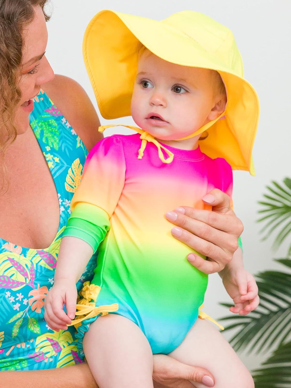 RuffleButts Baby Girls UPF 50+ Sun Protection Novelty Print Long Sleeve One Piece Rash Guard Swimsuit with Zipper