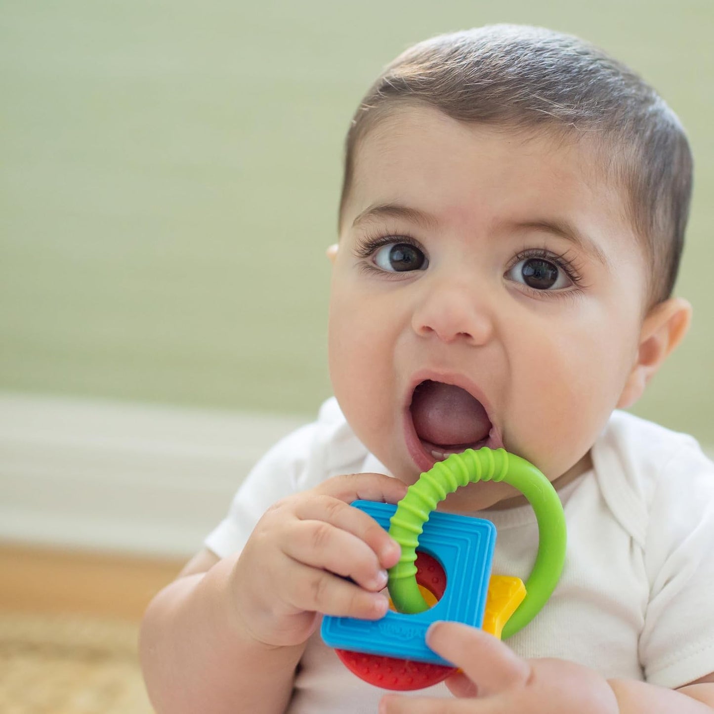 Dr. Brown's Learning Loop Baby Teether Ring, Multiple Shapes and Textures, 100% Silicone, BPA-Free, 3m+