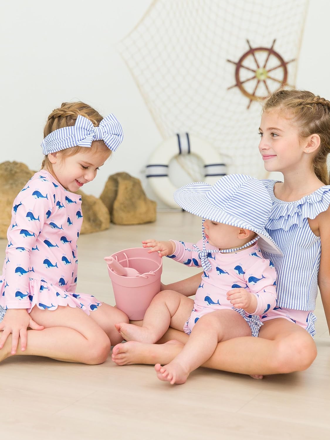 RuffleButts Baby Girls UPF 50+ Sun Protection Novelty Print Long Sleeve One Piece Rash Guard Swimsuit with Zipper