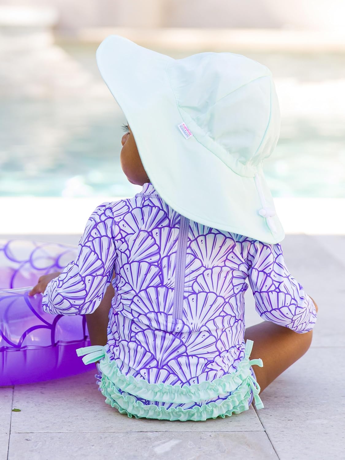 RuffleButts Baby Girls UPF 50+ Sun Protection Novelty Print Long Sleeve One Piece Rash Guard Swimsuit with Zipper