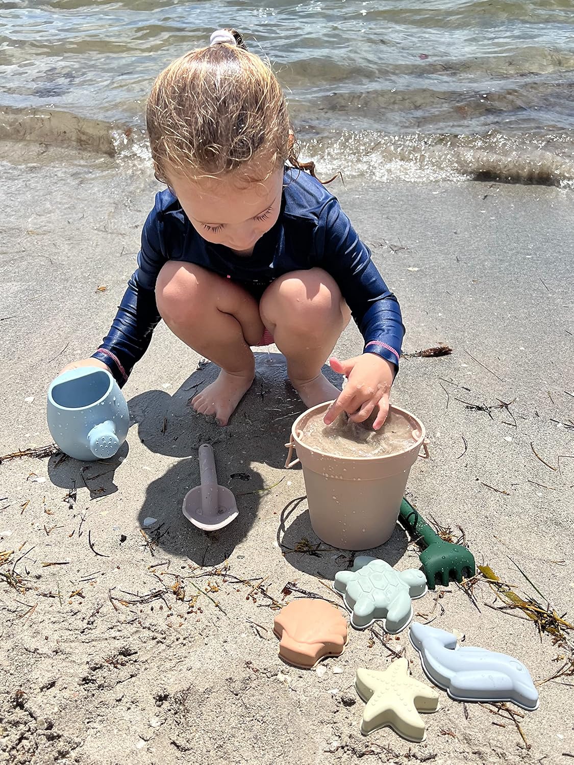 Silicone Beach Toys - Beach Bucket Set with Shovel, 4 Sand Molds - Travel-Friendly Kids Sand Toys in Net Carrying Bag - Safe Baby Sand Toys - Dishwasher-Safe (Light Green)