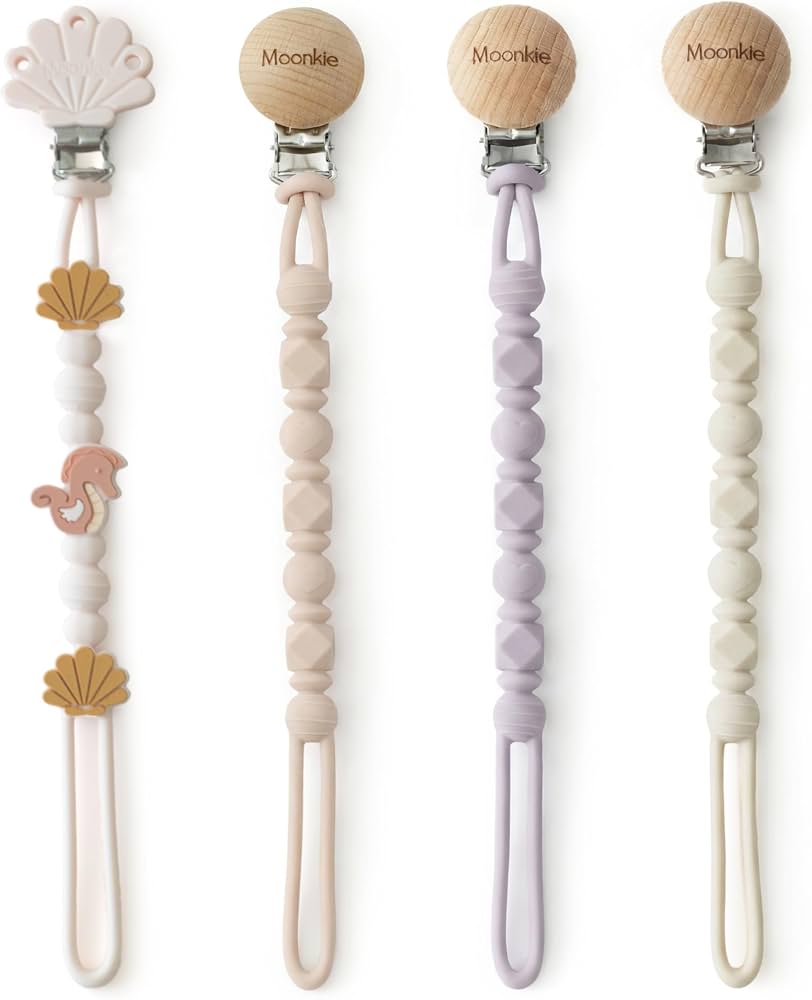Moonkie Silicone Pacifier Clips for Baby – Durable One-Piece Binky Holder, Mixed Styles Paci Clips, Baby Essentials for Newborn Boys & Girls - 4 Pack (Sunset Shore)
